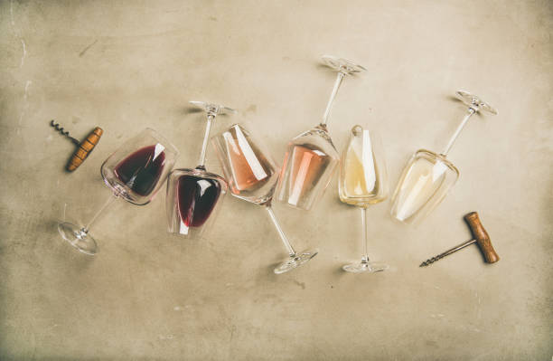 products/red-rose-and-white-wine-in-glasses-and-corkscrews-picture-id1054905888.jpg